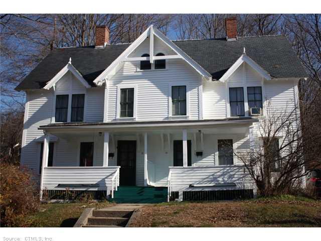 Exterior Front. Original Collins Company 2 Family House
