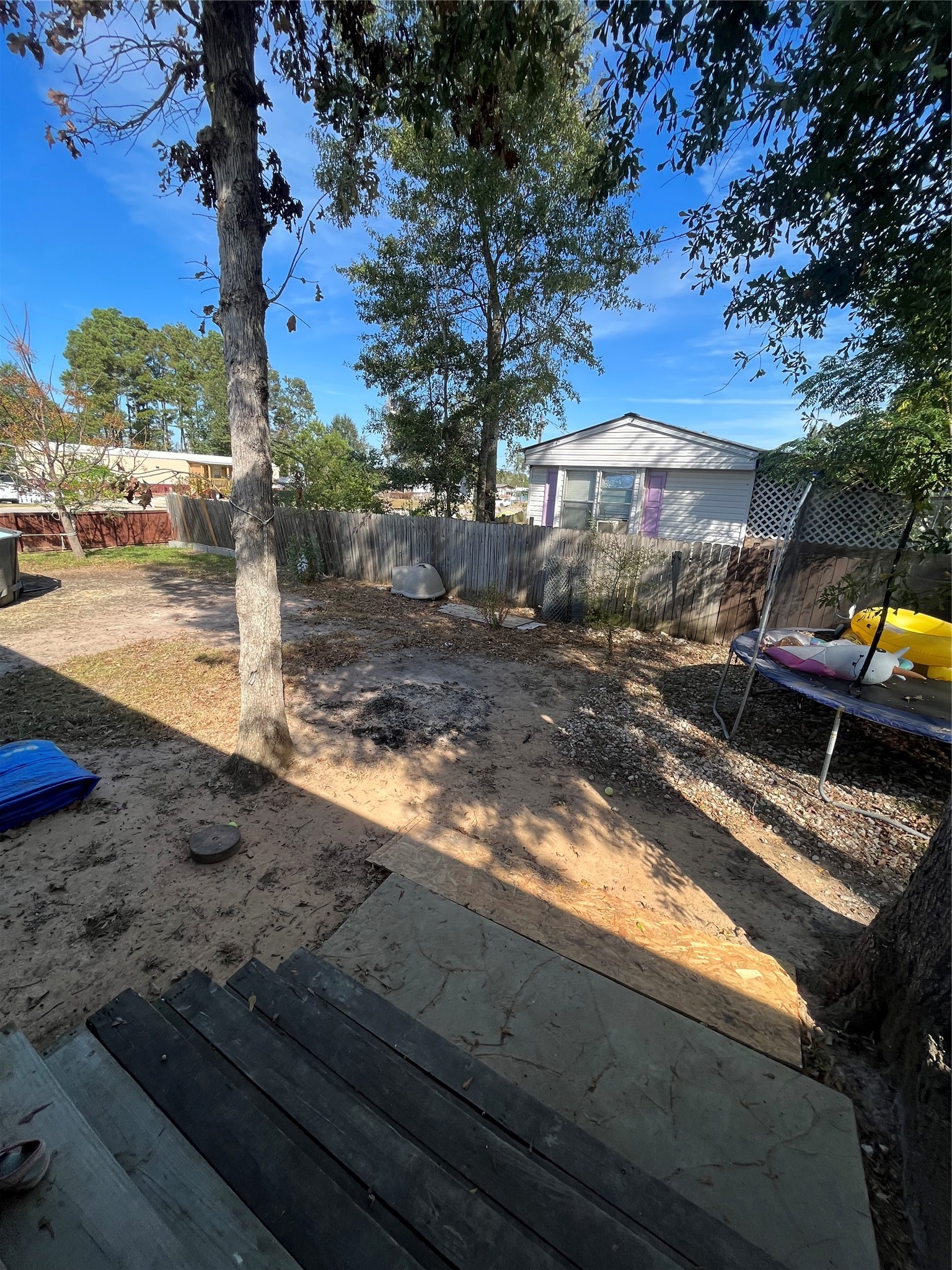 8026 Forest Trace Conroe, TX 77306 - Photo 4 of 28 a view of a yard with an outdoor space