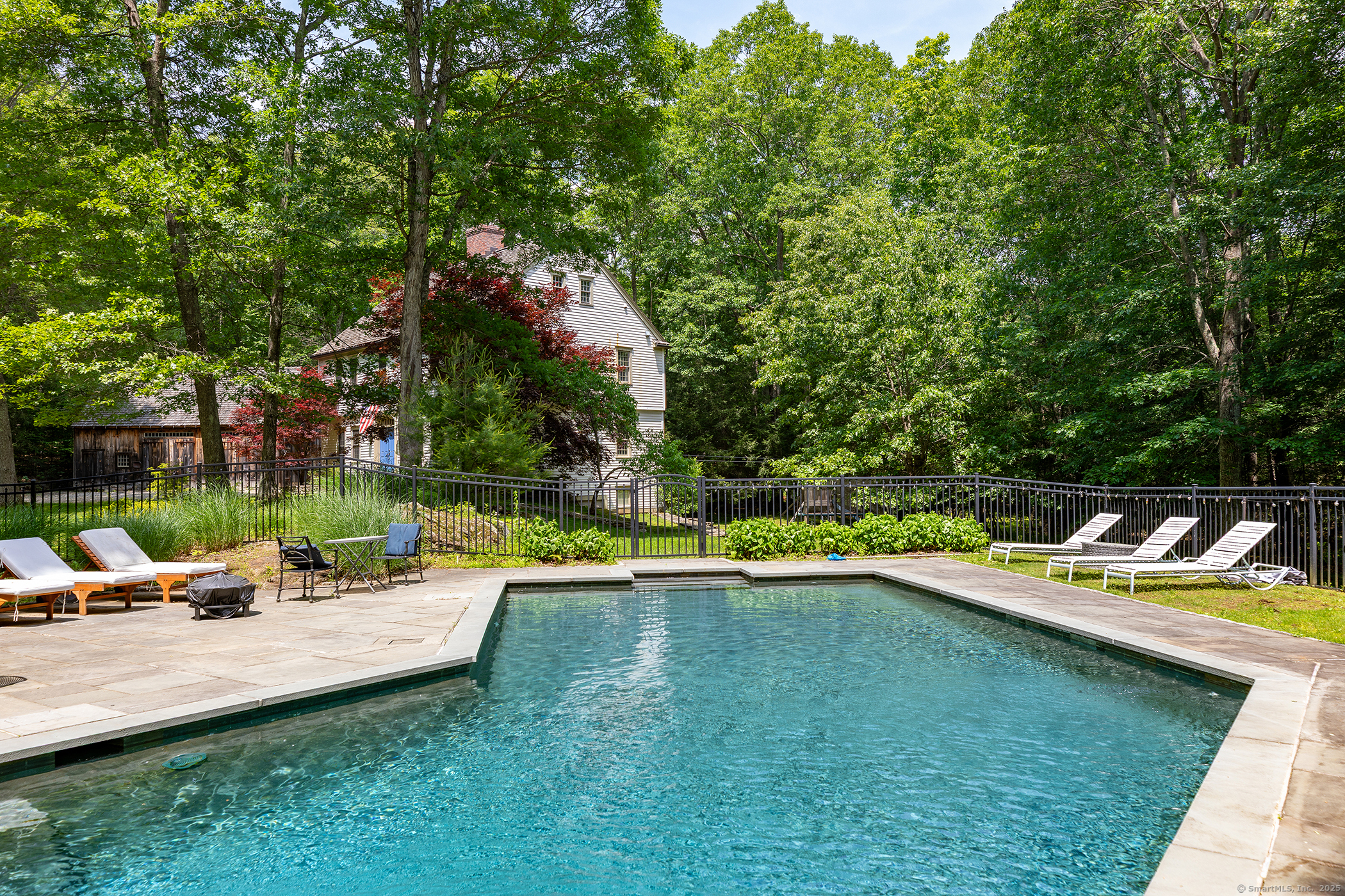 33 Sentry Hill Road Roxbury, CT 06783 - Photo 4 of 27 a view of a house with swimming pool and sitting area