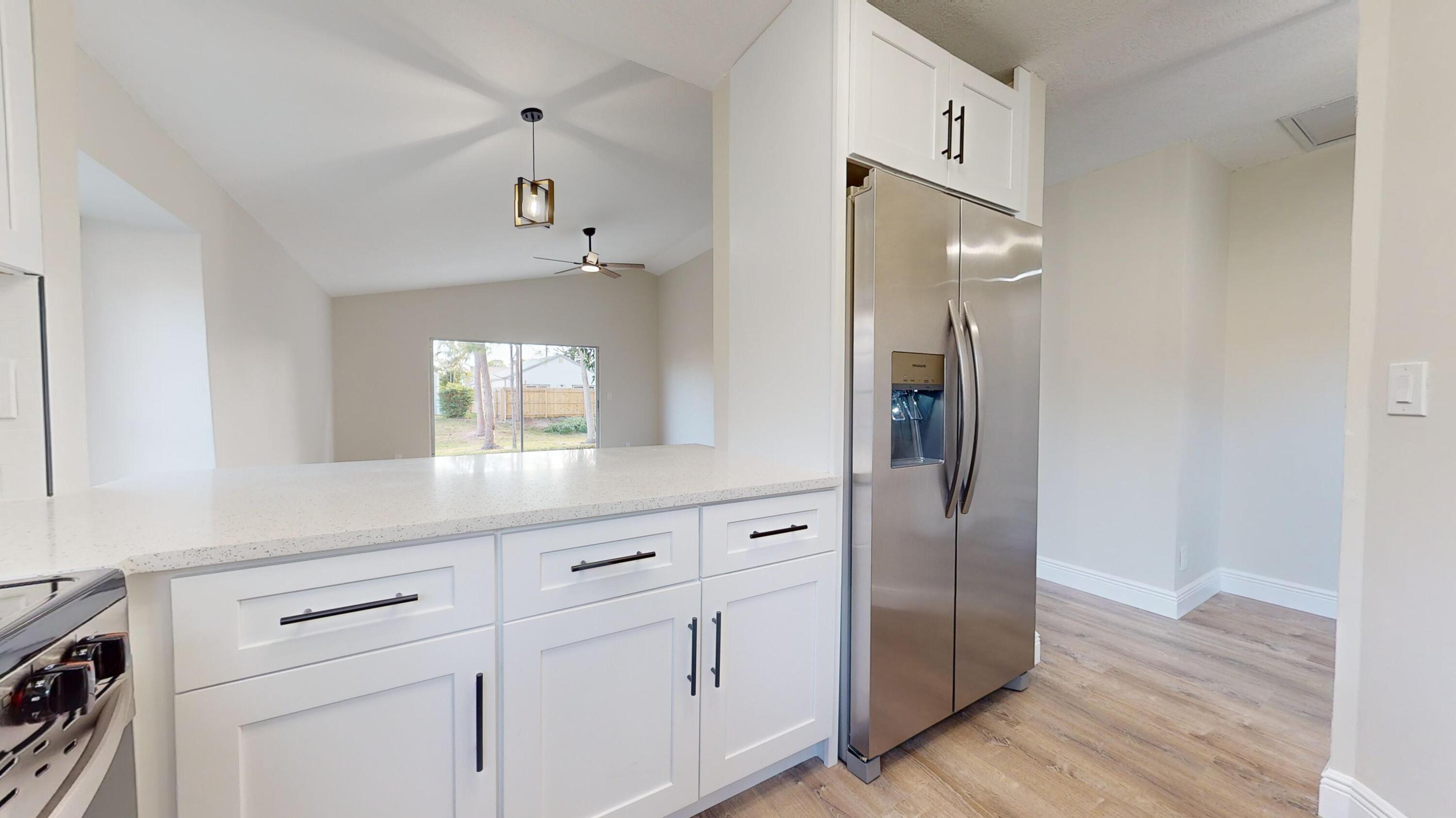 5740 Rambler Rose Way West Palm Beach, FL 33415 - Photo 6 of 25 Kitchen Island