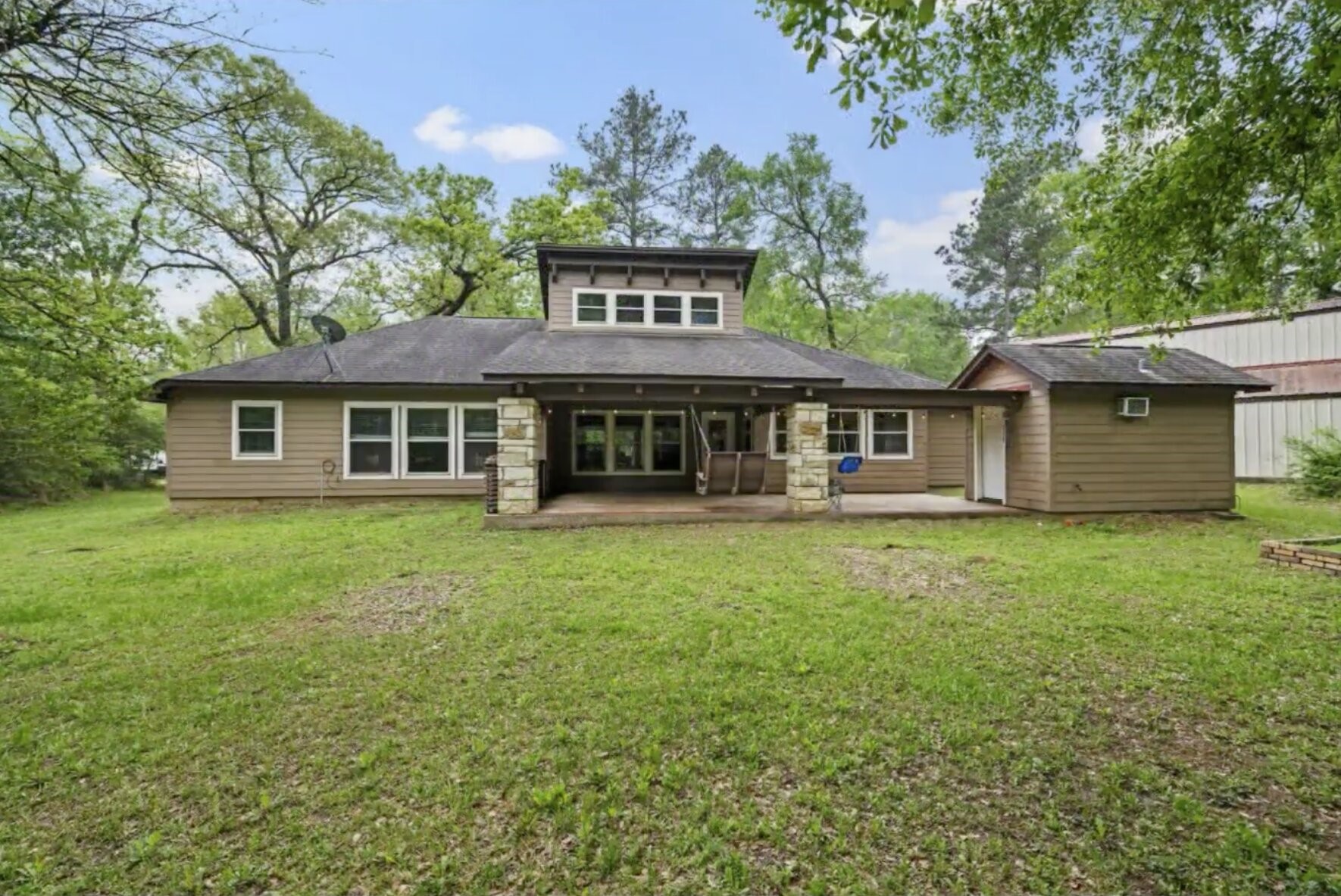 30338 Riley Road Waller, TX 77484 - Photo 36 of 46 a front view of a house with a garden