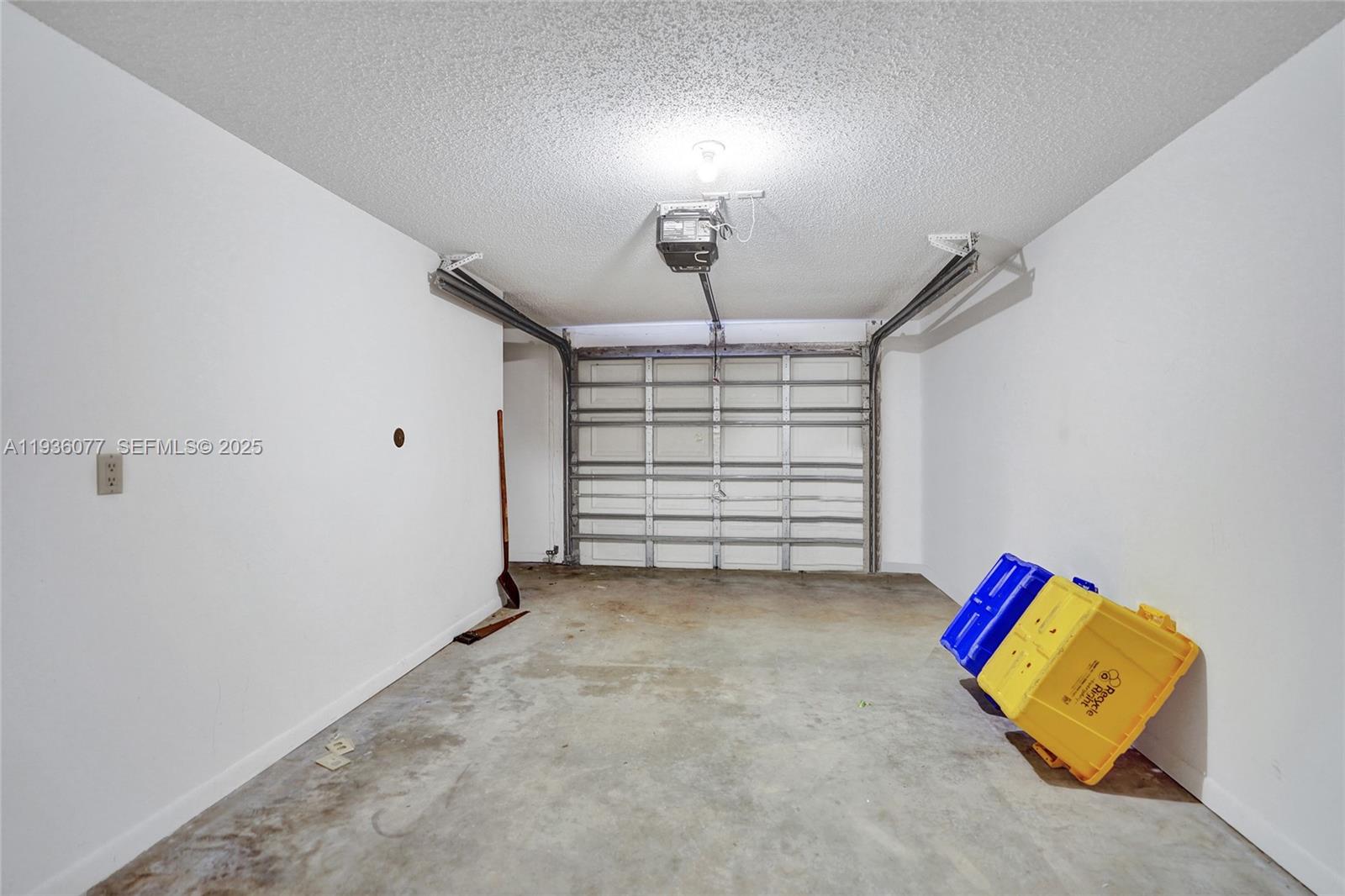 9569 Boca Gardens Parkway, Unit B Boca Raton, FL 33496 - Photo 26 of 40 a view of a room with stairs and a couch