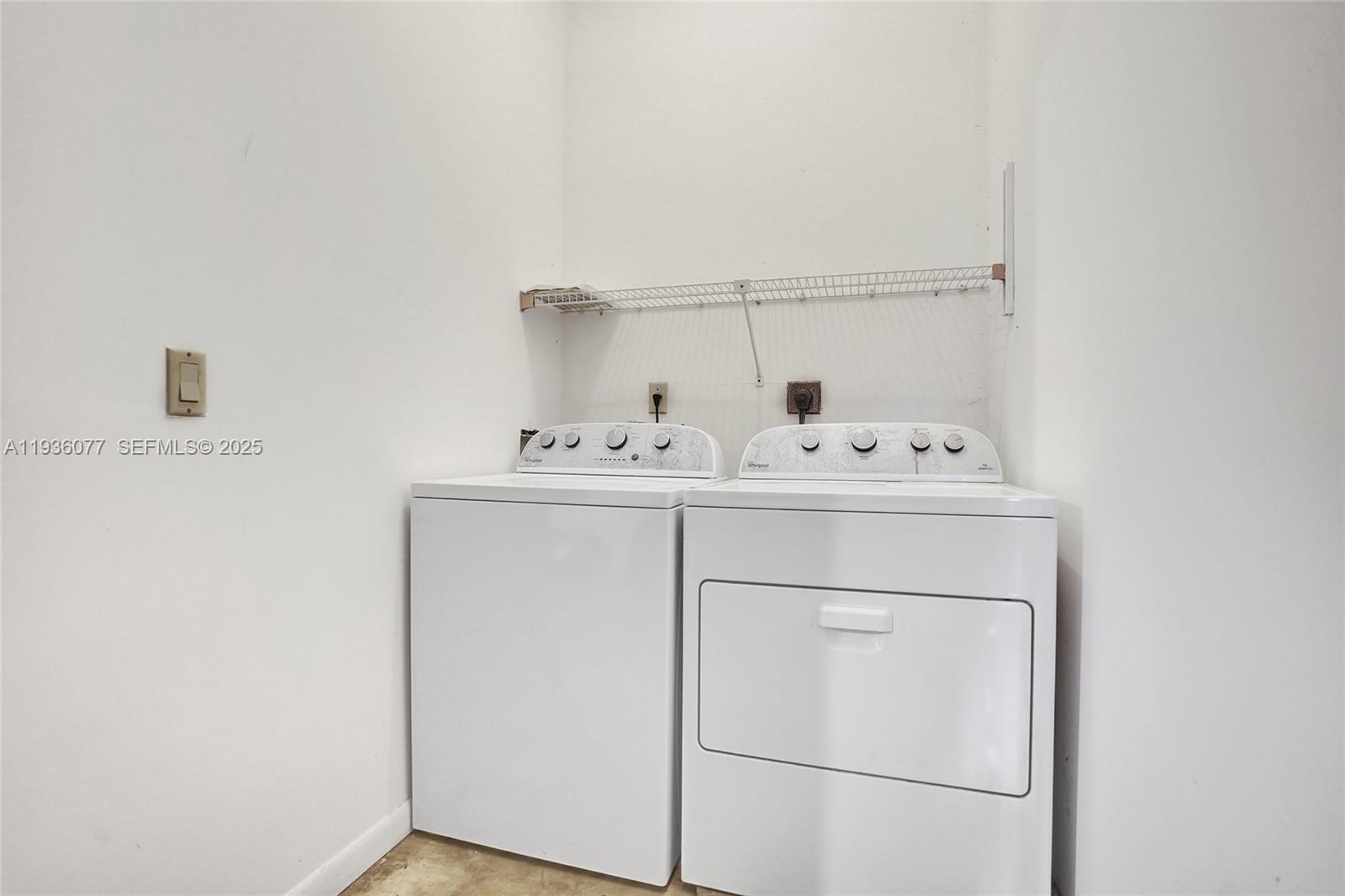 9569 Boca Gardens Parkway, Unit B Boca Raton, FL 33496 - Photo 27 of 40 a utility room with dryer and washer