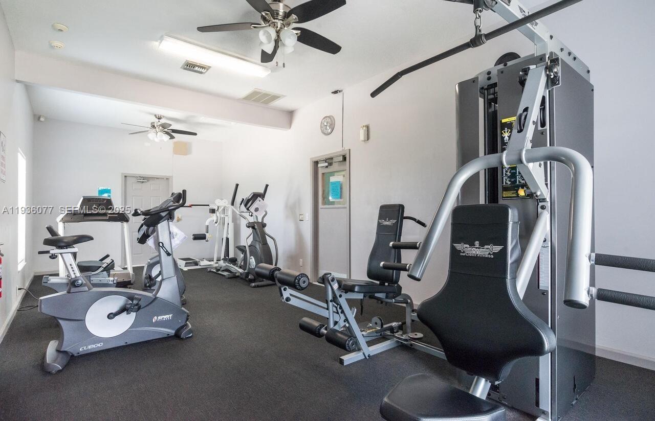 9569 Boca Gardens Parkway, Unit B Boca Raton, FL 33496 - Photo 33 of 40 a view of a room with gym equipment
