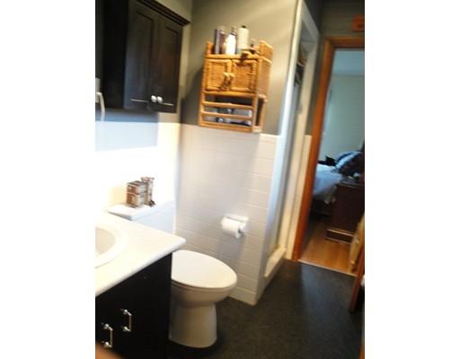 104 Forge Road Westport, MA 02790 - Photo 15 of 17 a bathroom with a sink and mirror