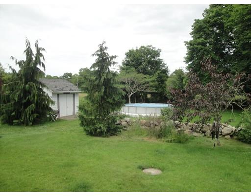 104 Forge Road Westport, MA 02790 - Photo 16 of 17 a view of a house with a backyard