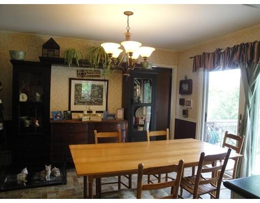 104 Forge Road Westport, MA 02790 - Photo 6 of 17 a view of a dining room with furniture and window