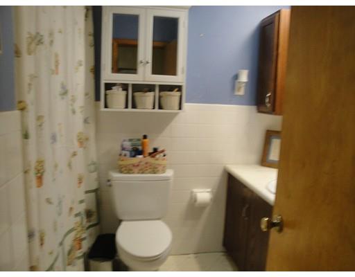 104 Forge Road Westport, MA 02790 - Photo 9 of 17 a bathroom with a toilet and a sink