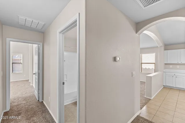 a view of a house with a snow in the background