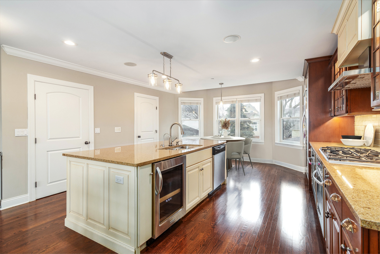 241 North Northwest Highway Park Ridge, IL 60068 - Photo 11 of 28 a kitchen with stainless steel appliances granite countertop a stove and a refrigerator