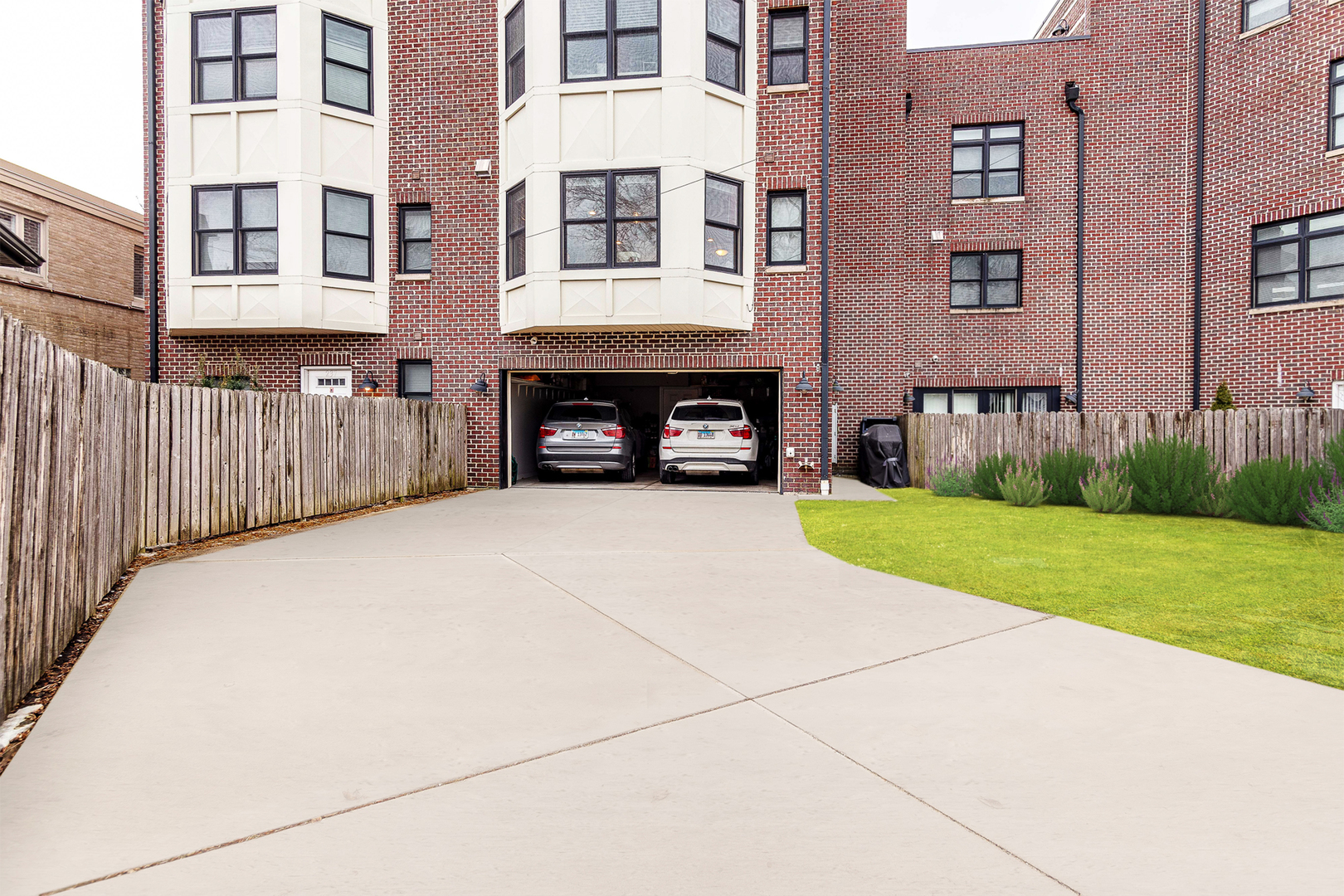 241 North Northwest Highway Park Ridge, IL 60068 - Photo 23 of 28 a view of building with yard and a car parked