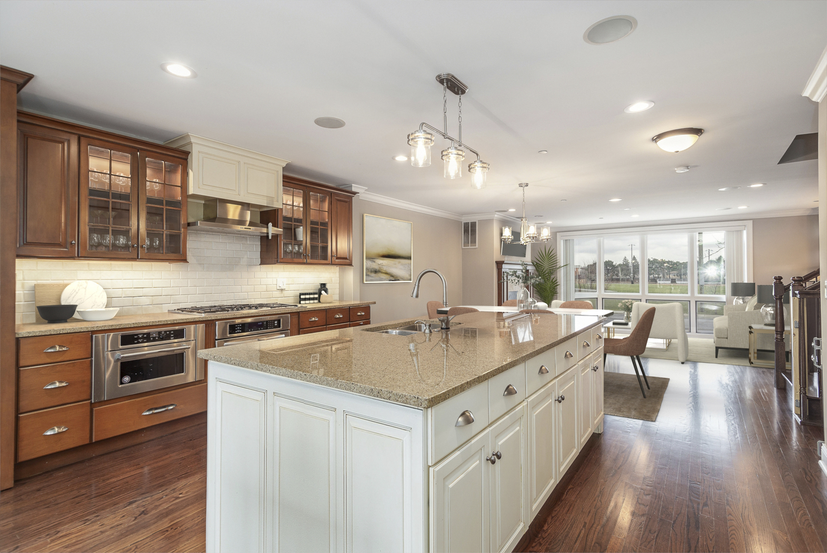 241 North Northwest Highway Park Ridge, IL 60068 - Photo 9 of 28 a large kitchen with stainless steel appliances granite countertop a lot of counter space and wooden floors