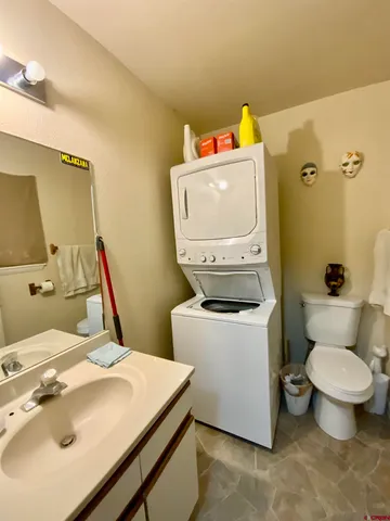 a bathroom with a sink and toilet