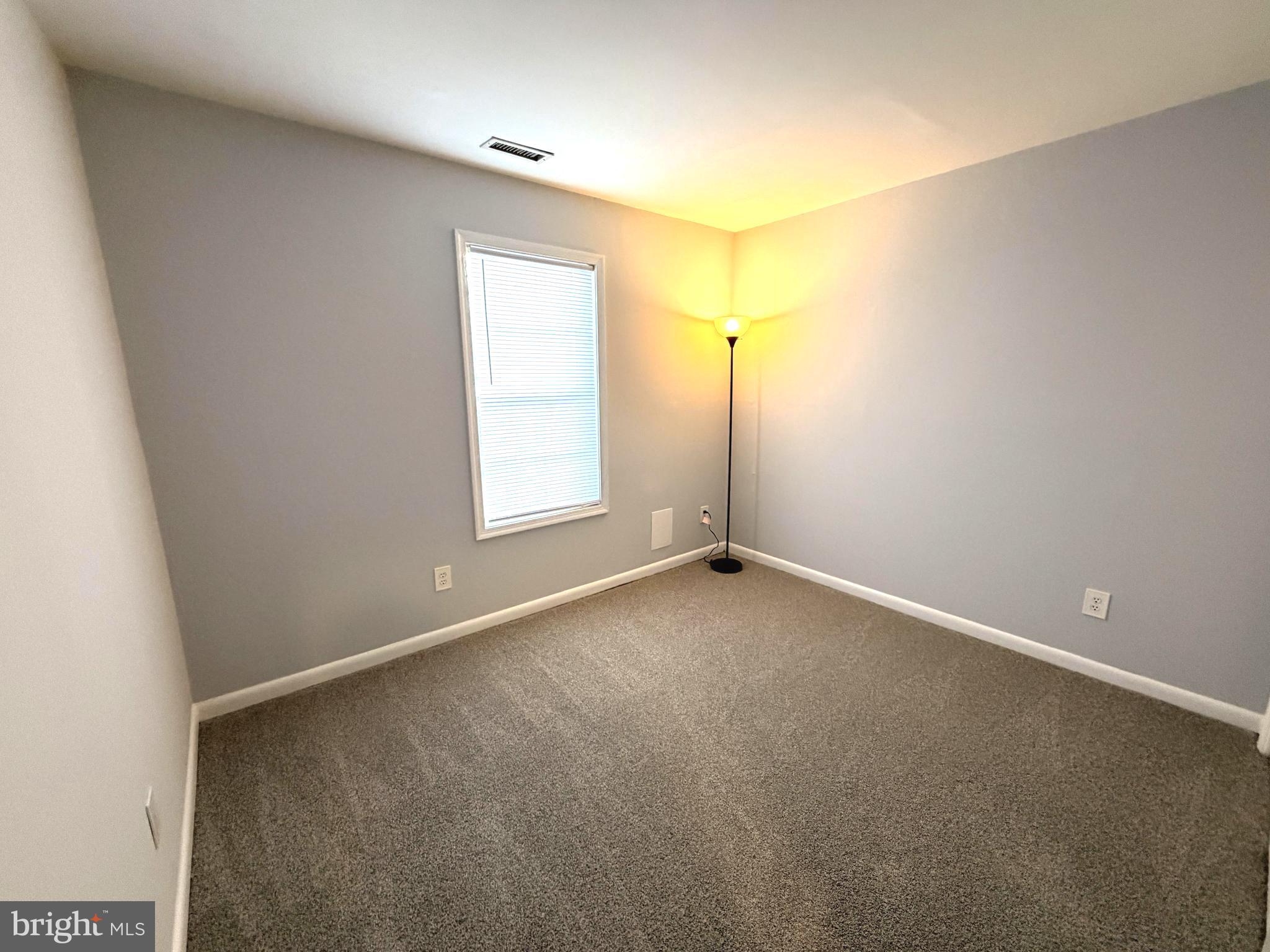 660 Ripplebrook Drive Culpeper, VA 22701 - Photo 13 of 19 an empty room with windows