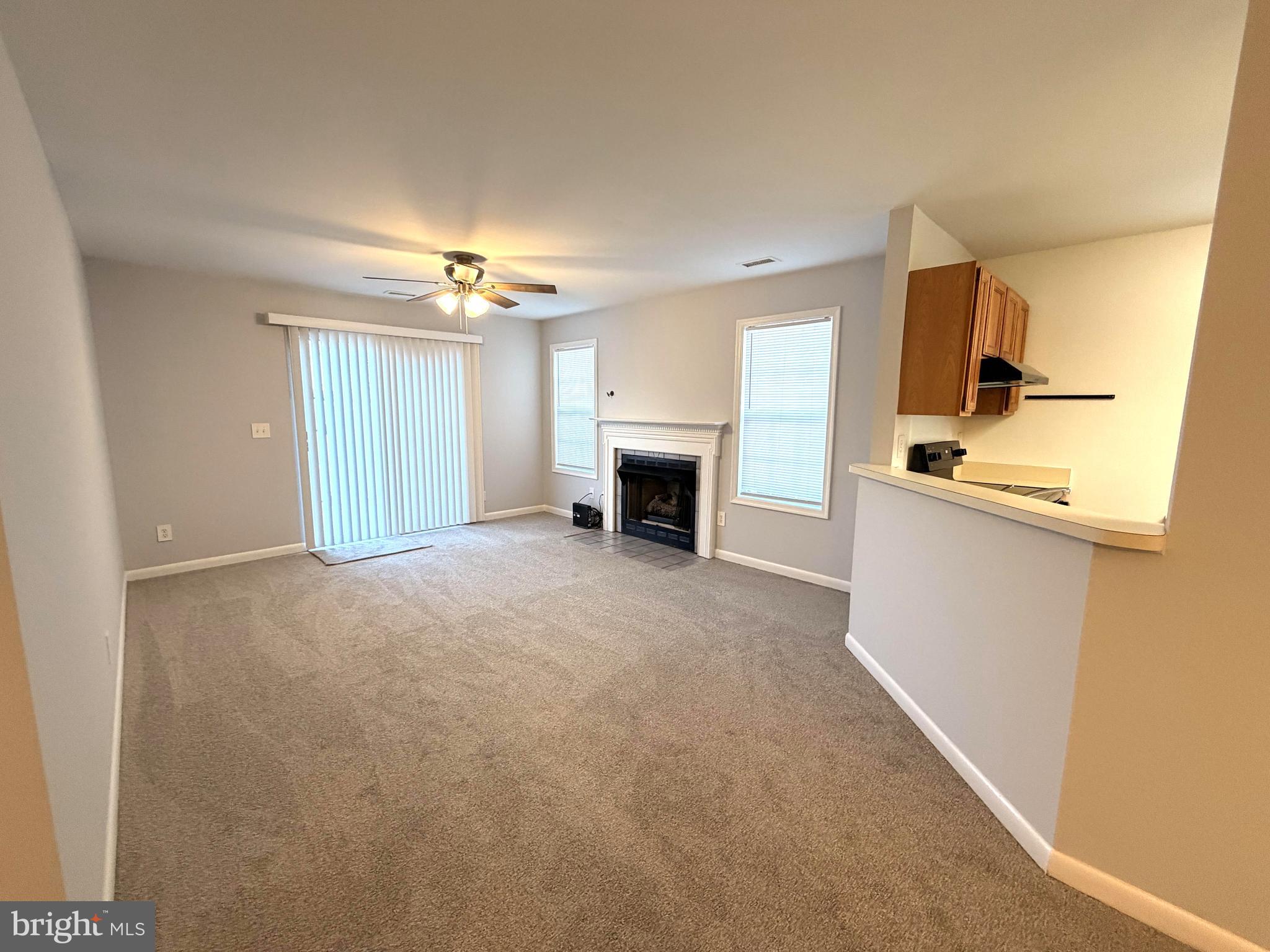 660 Ripplebrook Drive Culpeper, VA 22701 - Photo 2 of 19 a view of a kitchen with a sink and a fireplace