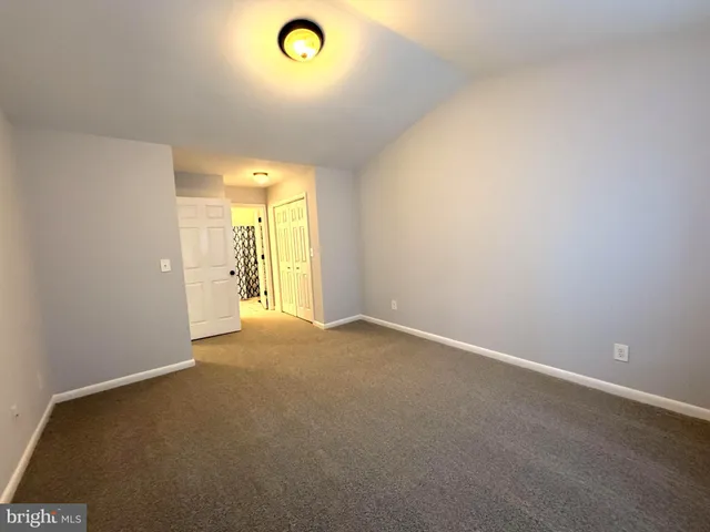 a view of a room with a window