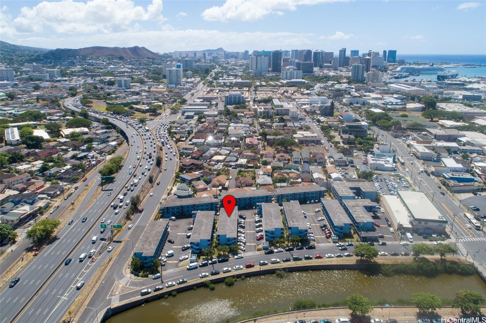 1209 Kokea Street, Unit F203 Honolulu, HI 96817 - Photo 14 of 14 an aerial view of residential houses with outdoor space