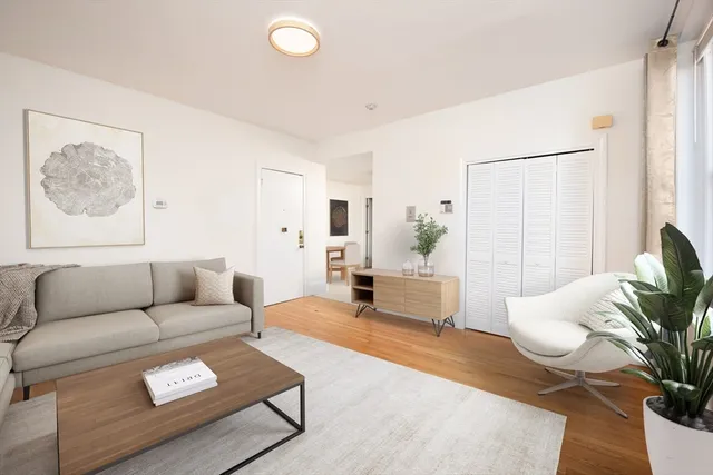 a living room with furniture and a couch