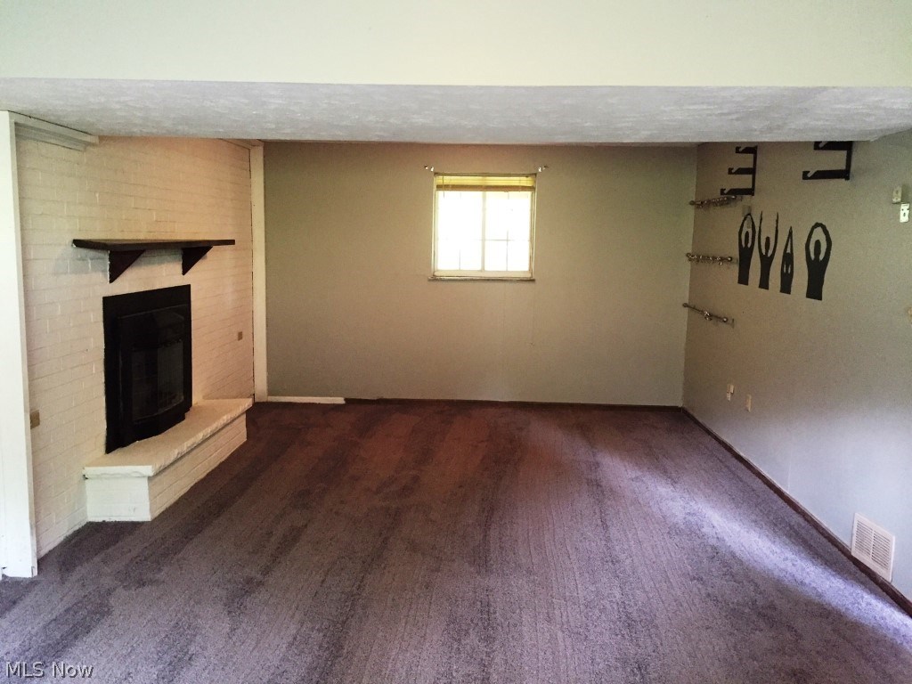 1765 Mt Tom Road Marietta, OH 45750 - Photo 14 of 26 Family Room with Gas Fireplace