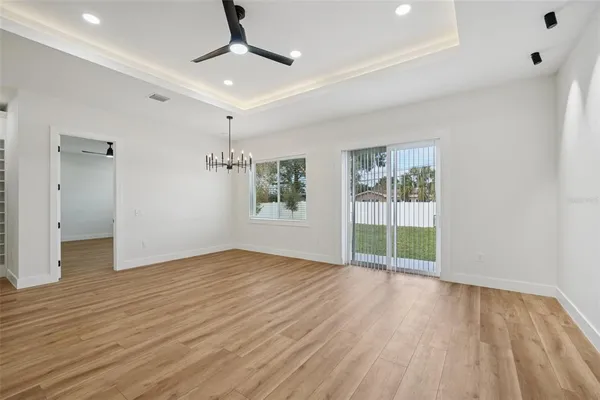 a bathroom with a double vanity sink mirror and shower