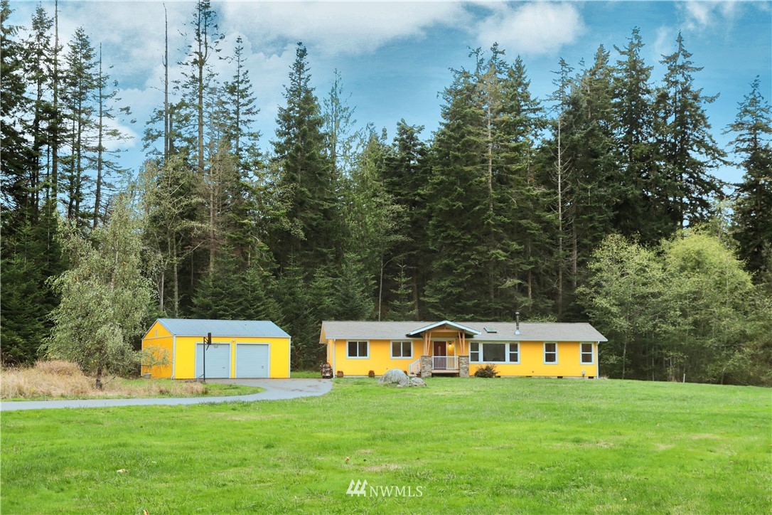 6416 Wahl Road Freeland, WA 98249 - Photo 1 of 40 a view of a house with a yard