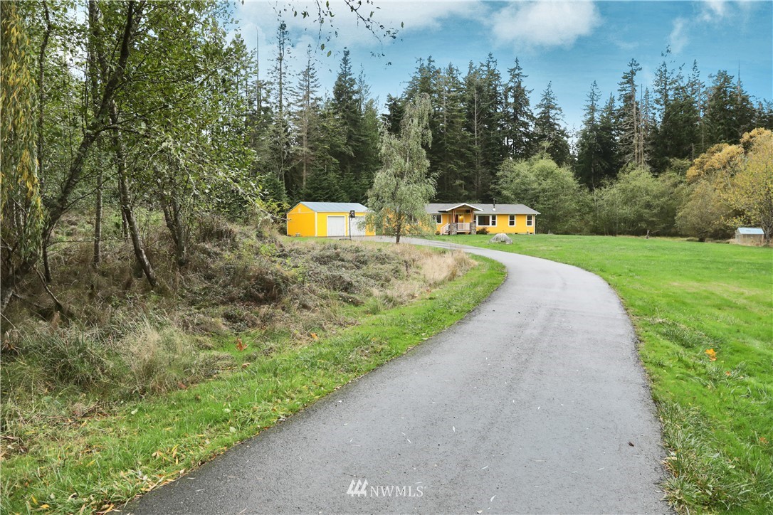 6416 Wahl Road Freeland, WA 98249 - Photo 37 of 40 a view of a park with large trees