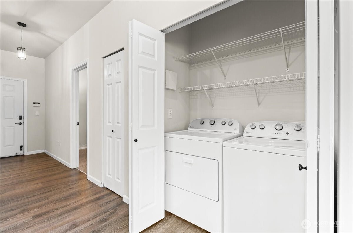 17426 Bothell Way Northeast, Unit A302 Bothell, WA 98011 - Photo 18 of 40 a view of utility room with washer and dryer