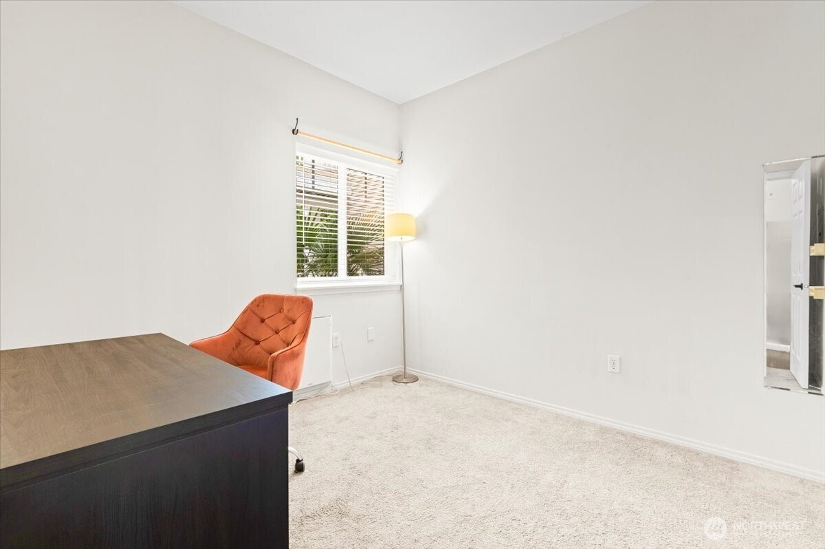 17426 Bothell Way Northeast, Unit A302 Bothell, WA 98011 - Photo 28 of 40 an empty room with windows