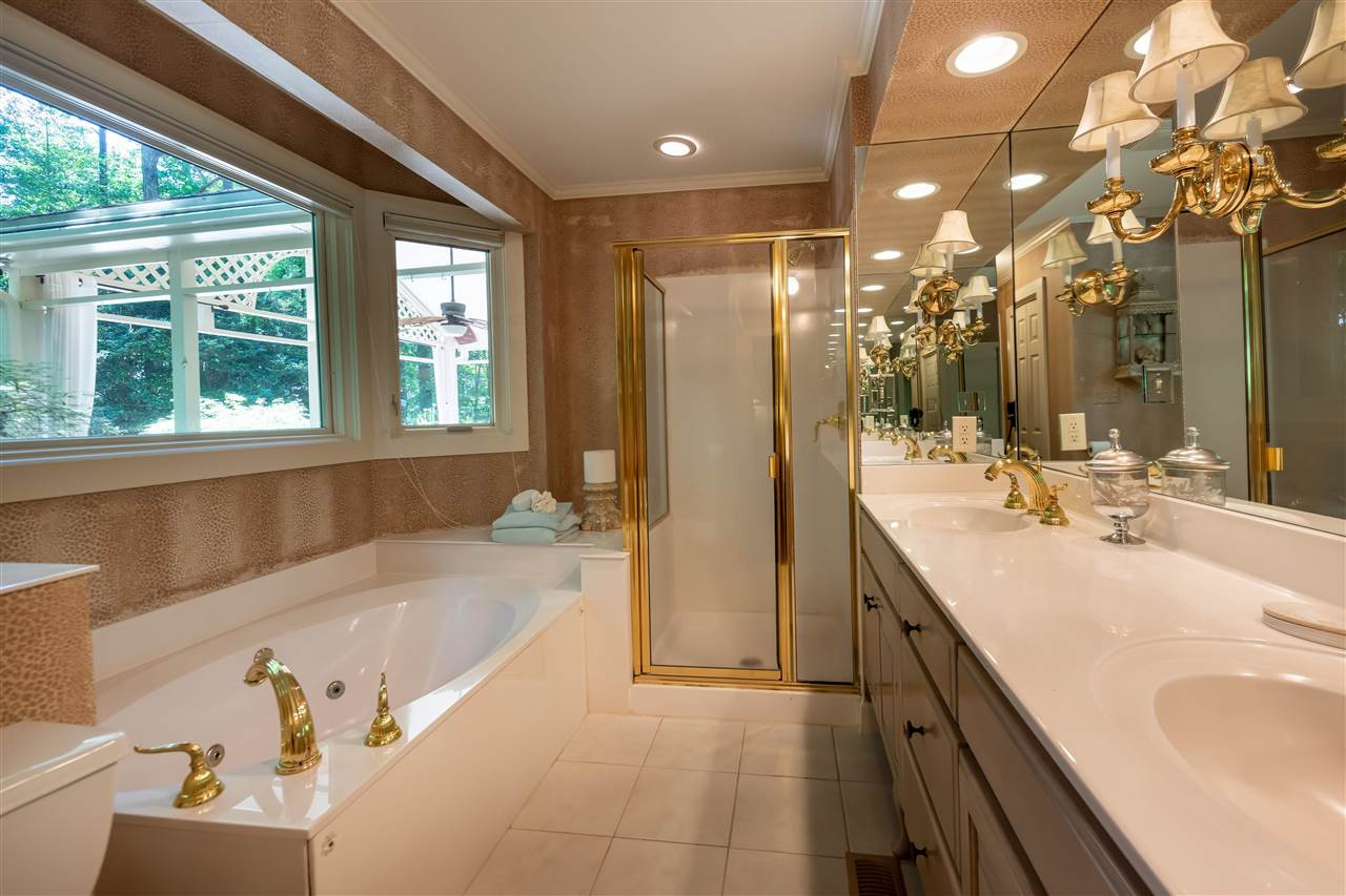 7931 Netherlands Drive Raleigh, NC 27606 - Photo 13 of 26 Master Bathroom