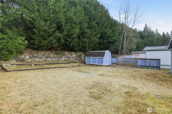 a view of yard with swimming pool