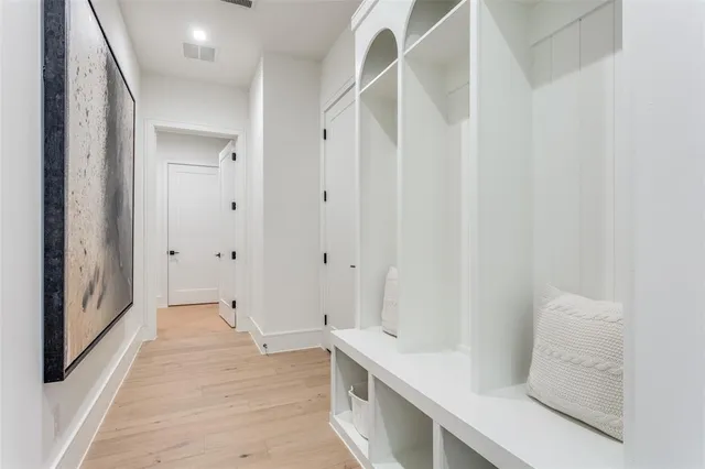 a bathroom with a sink and a large mirror