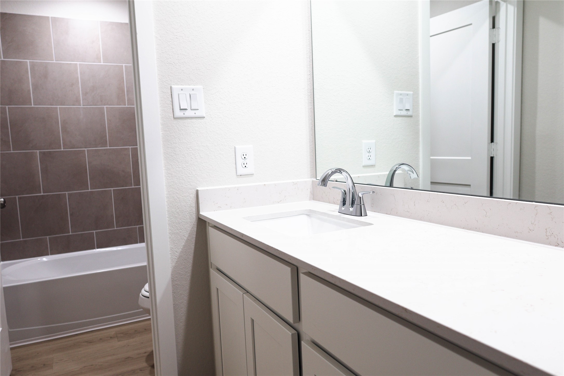 247 Brazen Forest Trail Magnolia, TX 77354 - Photo 16 of 18 a bathroom with a sink and a mirror