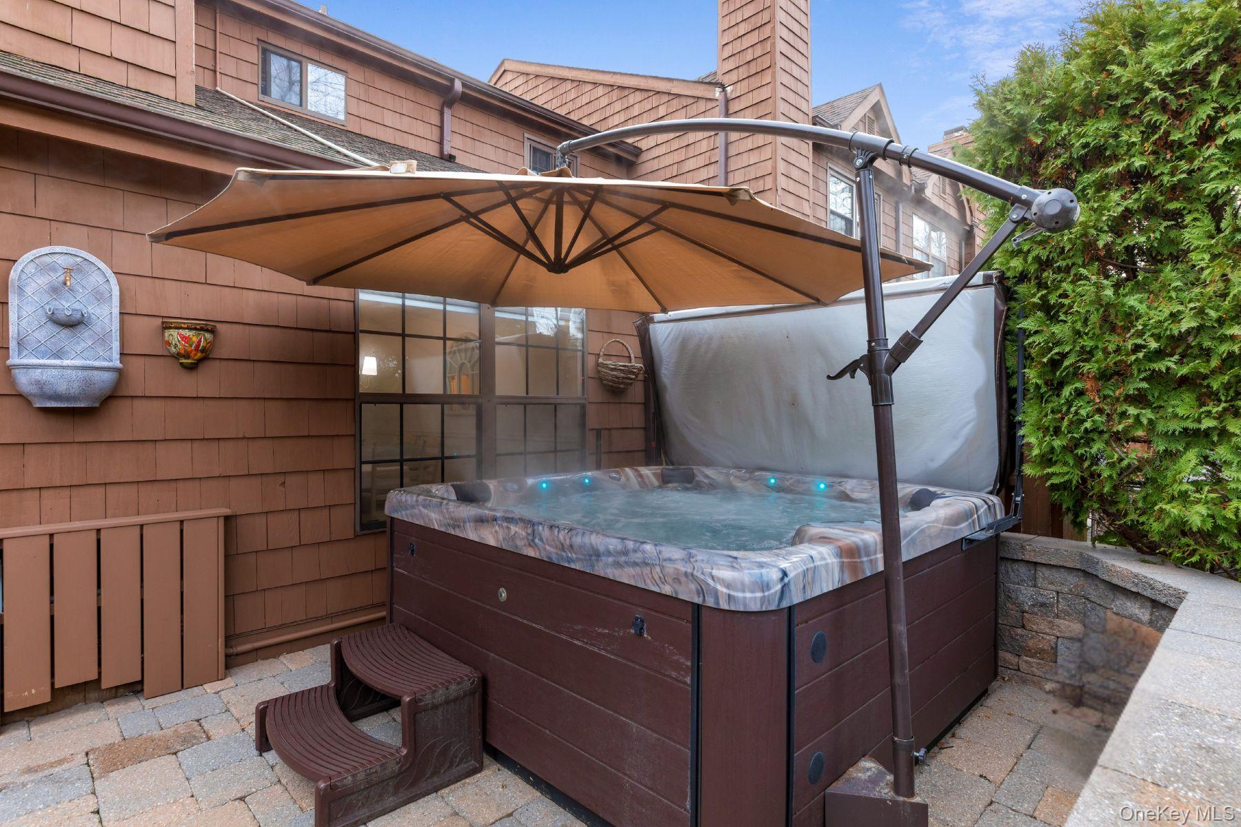 17 Sutton Place Islip, NY 11751 - Photo 29 of 32 View of patio featuring a hot tub