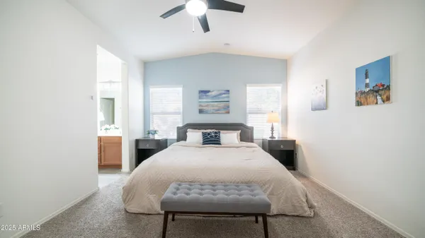 a bathroom with a double vanity sink and mirror