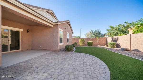 a view of a street with a building in the background