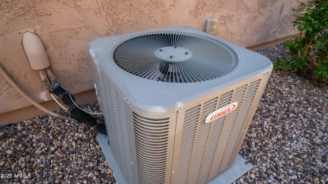 a swimming pool with large glass windows and painted walls