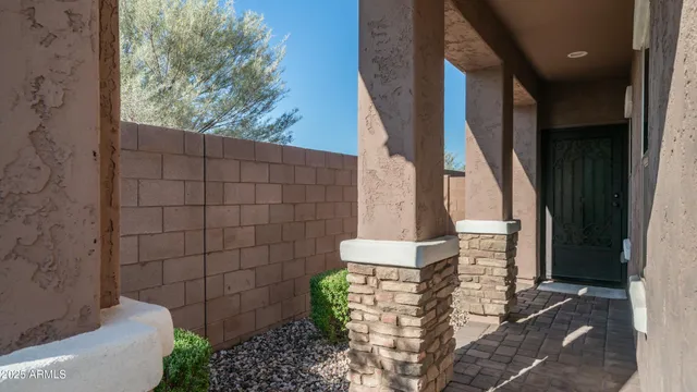 a bathroom with a toilet and shower