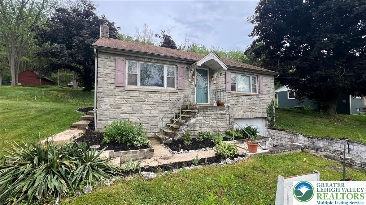 1644 Moselem Spring Road Hamburg, PA 19526 - Photo 1 of 24 A charming stone facade with a welcoming entry offers a classic appeal, complemented by mature landscaping.