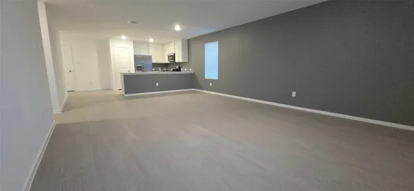 a view of a kitchen with a sink