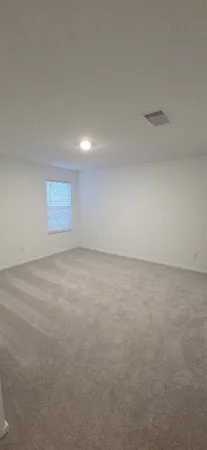 an empty room with a natural light