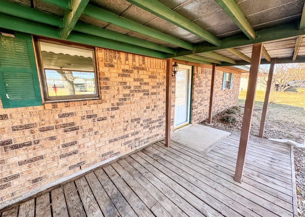 119 Autumn Drive Early, TX 76802 - Photo 4 of 29 a view of porch with wooden floor