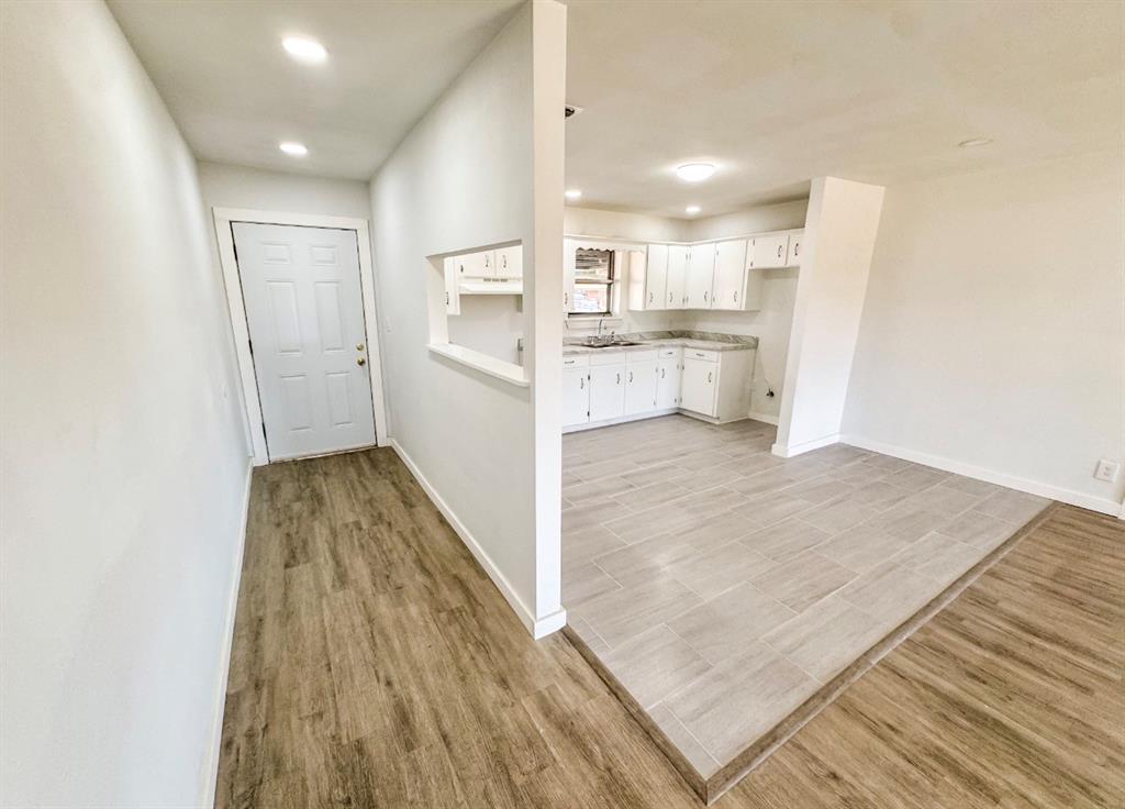 119 Autumn Drive Early, TX 76802 - Photo 6 of 29 a view of a kitchen with wooden floor