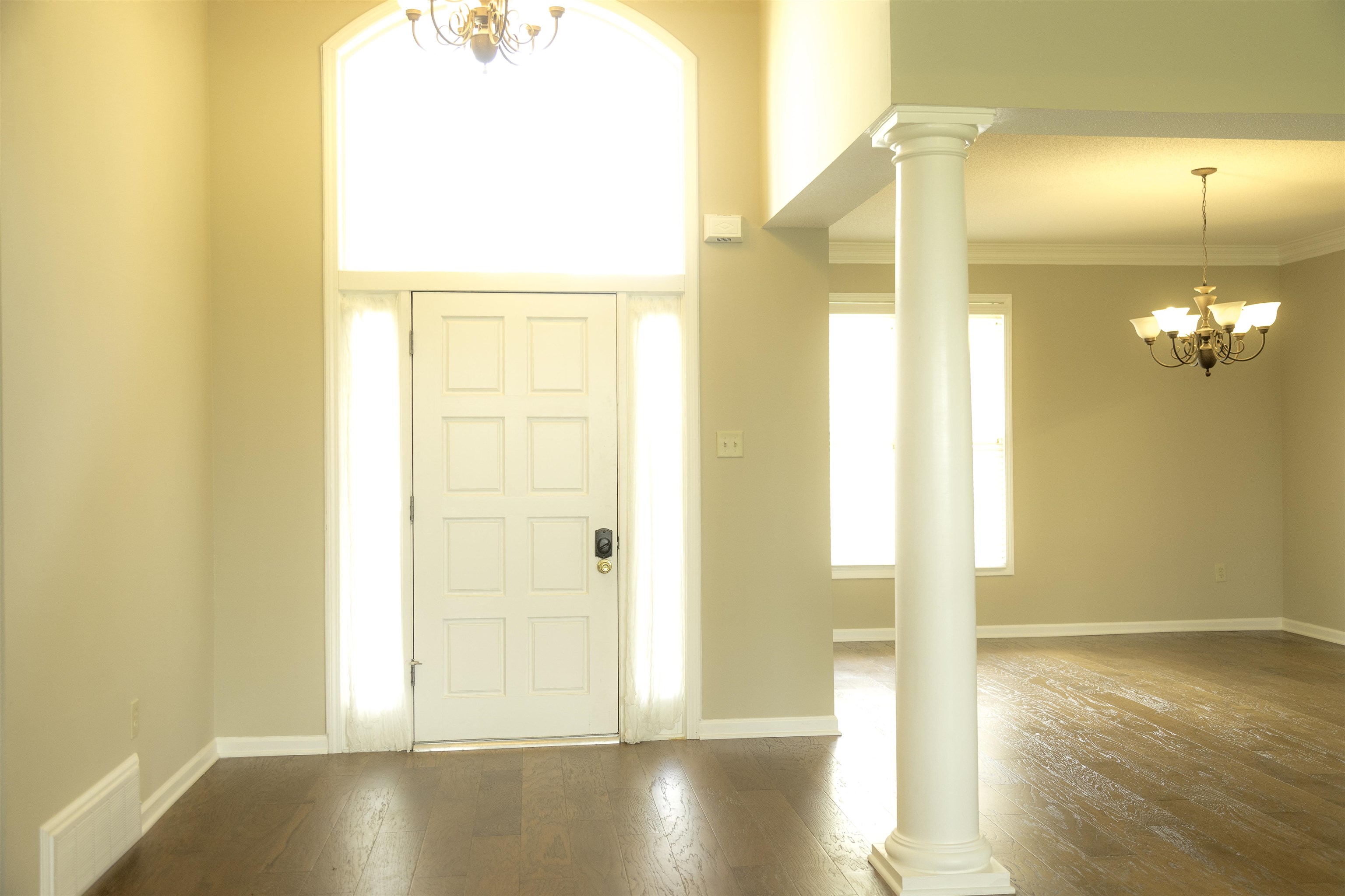 10420 Pilot Rock Road Collierville, TN 38017 - Photo 2 of 27 Grand open foyer - vaulted ceiling- new hardwood floors -open floor plan for living room and dining room