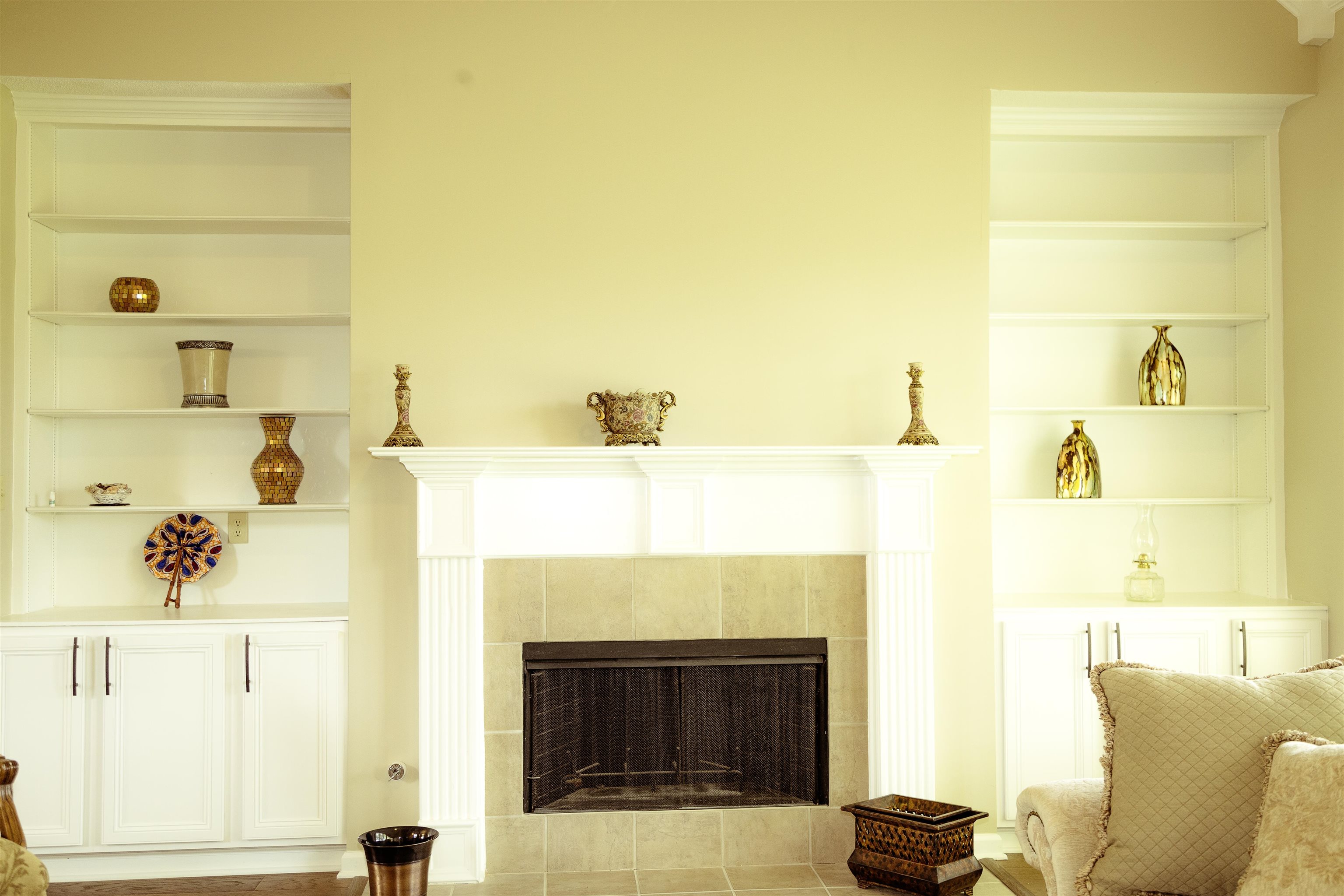 10420 Pilot Rock Road Collierville, TN 38017 - Photo 6 of 27 Living Room has a cozy fireplace with a turn on switch. Built in bookcases and all new hardwood floors.