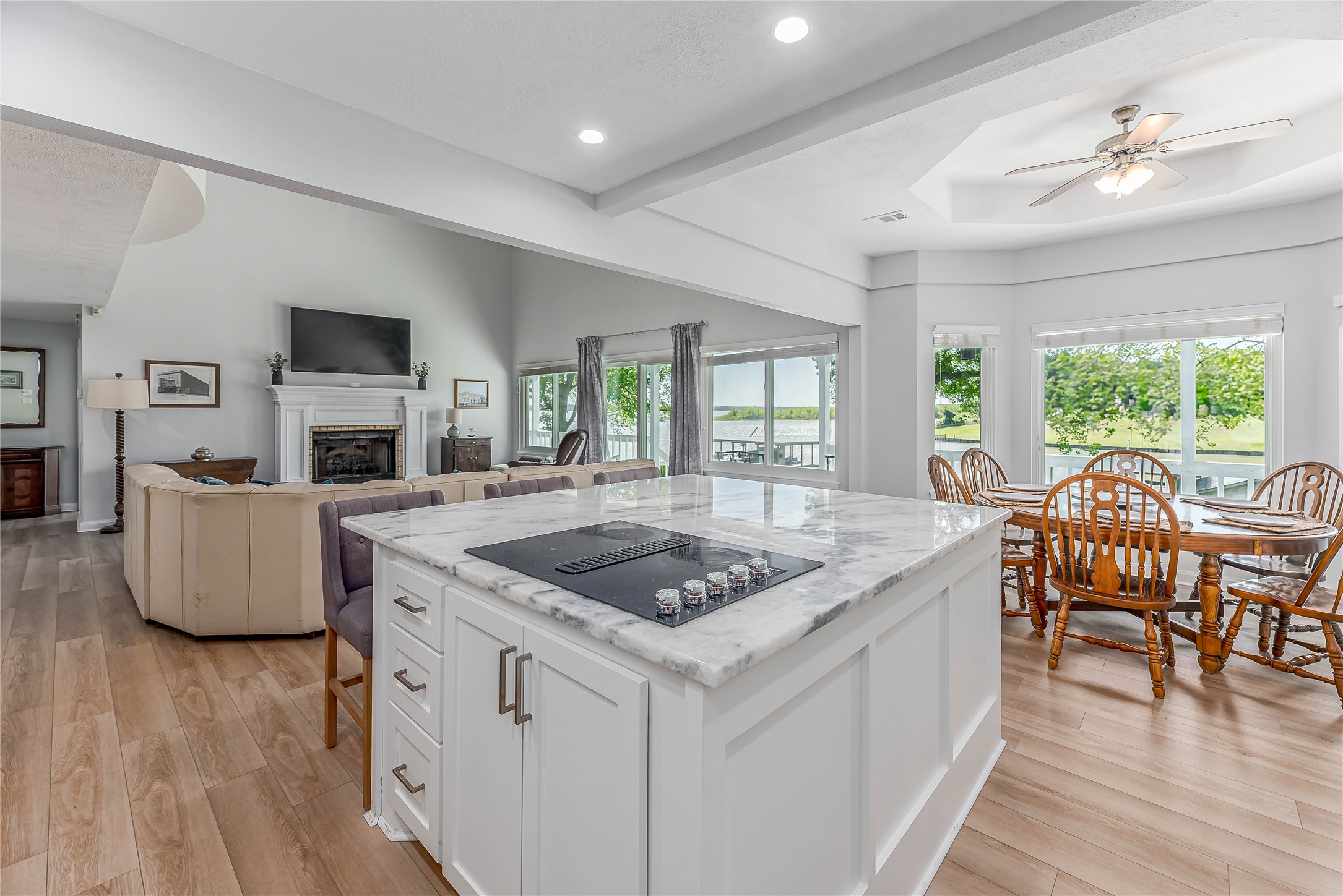 331 Memphis Belle Trinity, TX 75862 - Photo 12 of 50 a kitchen with stainless steel appliances granite countertop a sink a stove and a living room
