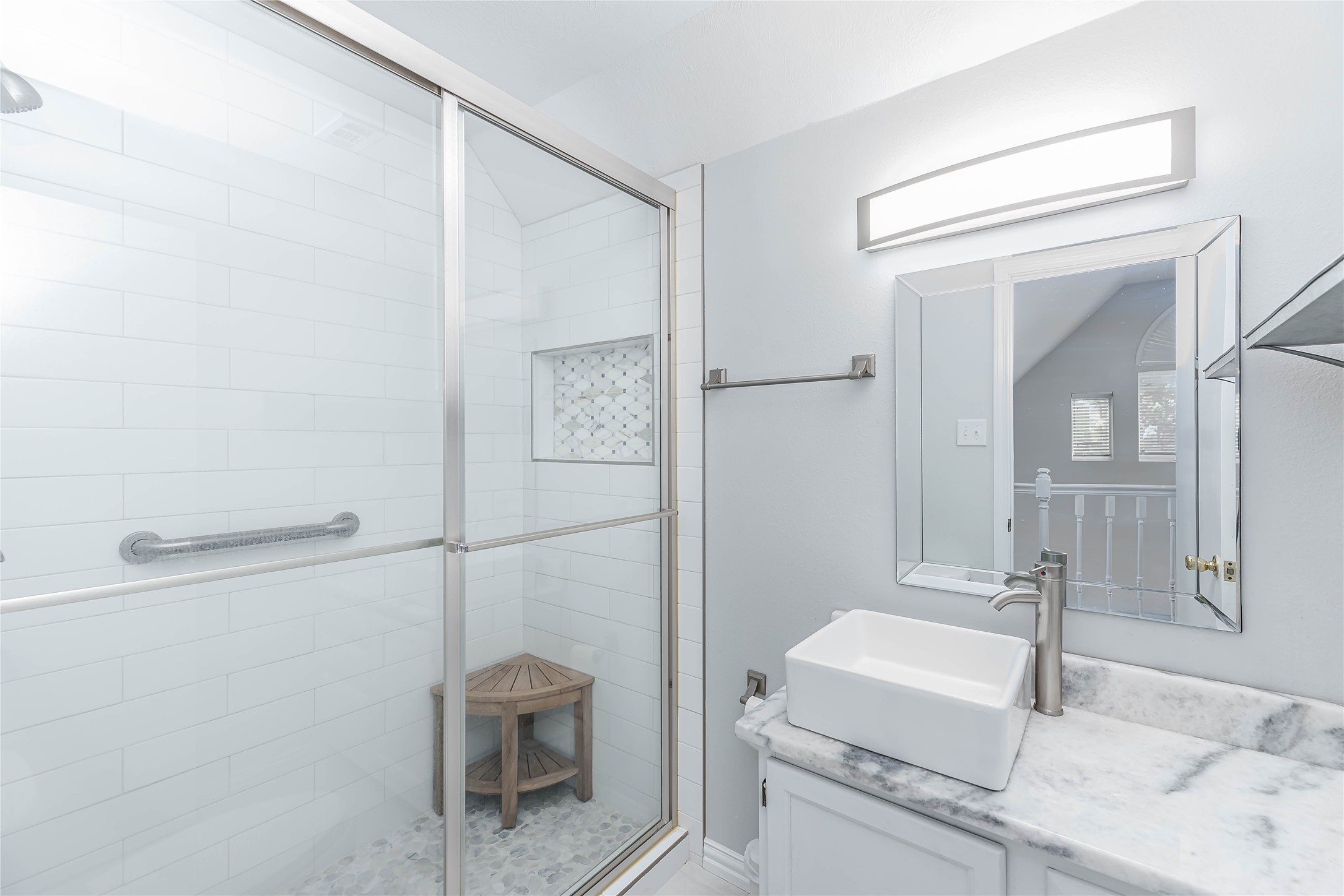 331 Memphis Belle Trinity, TX 75862 - Photo 22 of 50 a bathroom with a granite countertop sink a toilet and a mirror