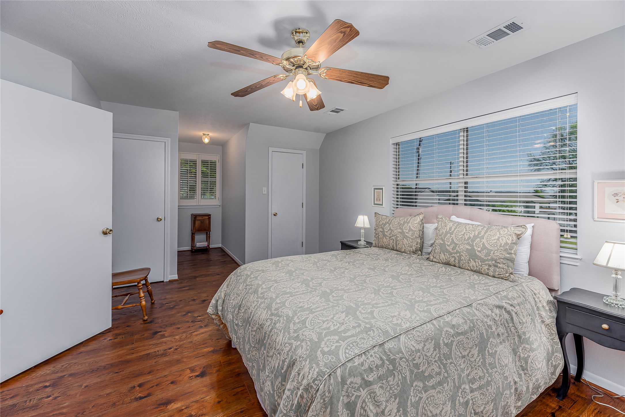 331 Memphis Belle Trinity, TX 75862 - Photo 23 of 50 a spacious bedroom with a bed and a table in it