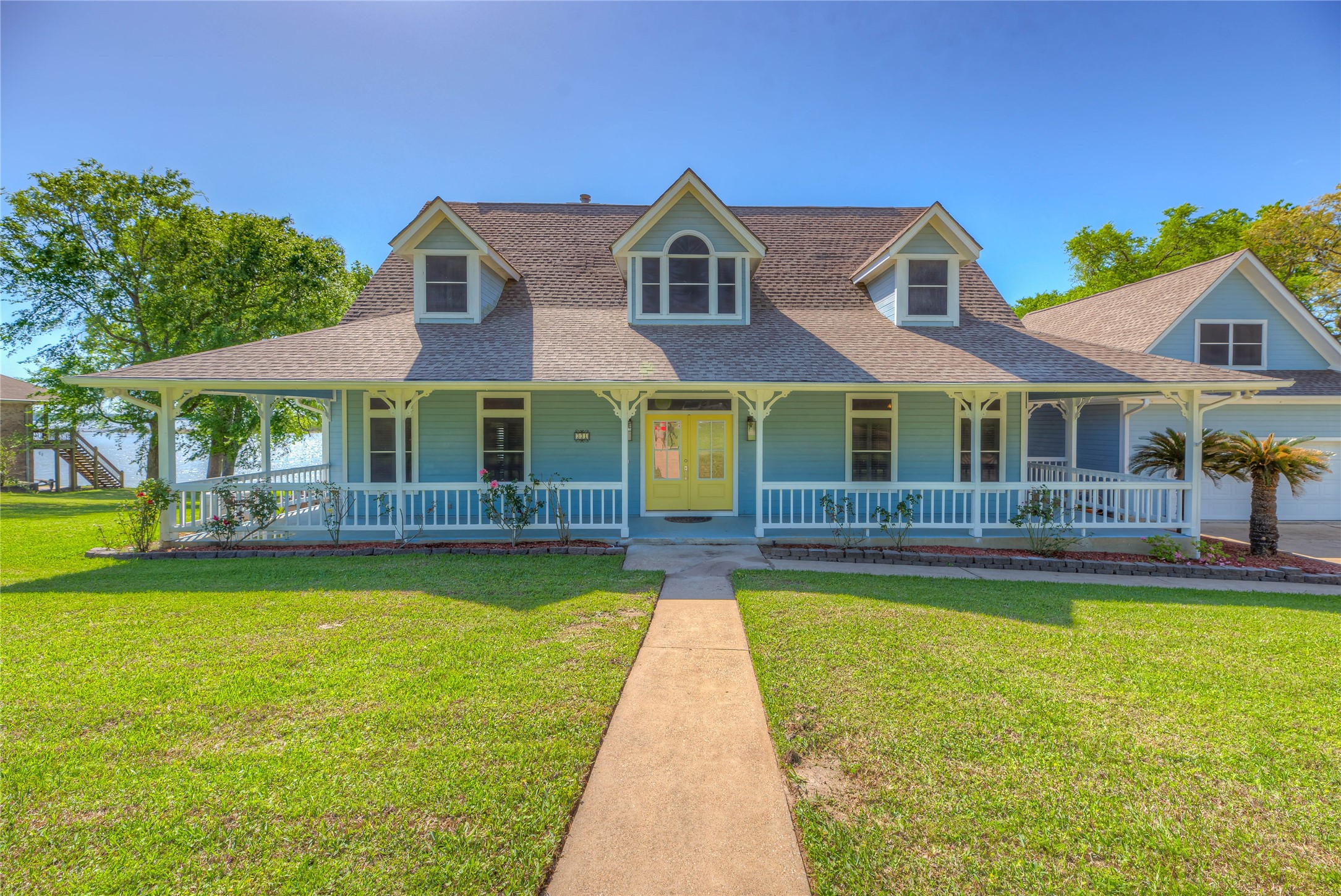 331 Memphis Belle Trinity, TX 75862 - Photo 30 of 50 a front view of a house with swimming pool having outdoor seating