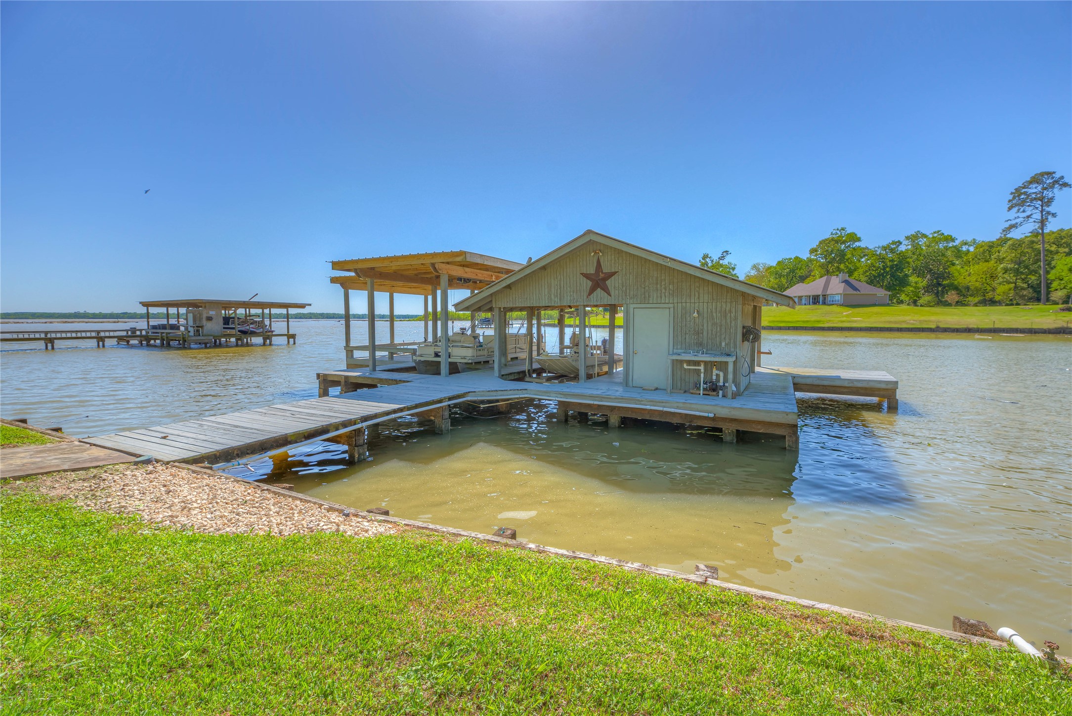 331 Memphis Belle Trinity, TX 75862 - Photo 35 of 50 a view of a house with pool and a yard