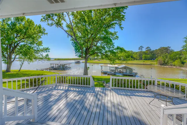 a view of lake with a large garden
